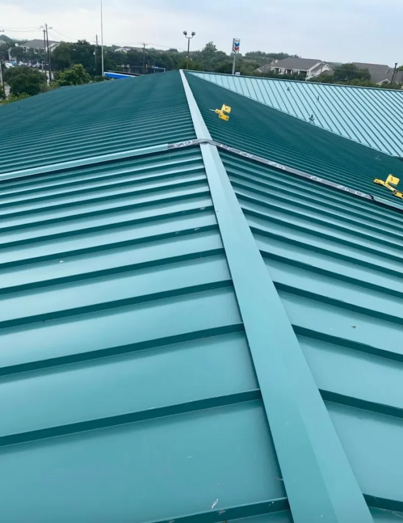 Green commercial metal roof ridge and valley for Metal Roof Repair in Rockledge